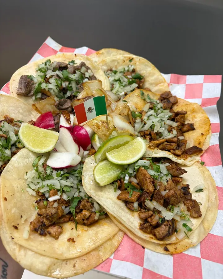 Street tacos at Casa Dorado — carne asada and al pastor with lime and radish